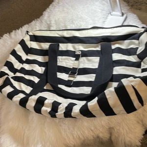 Black white striped duffel bag.